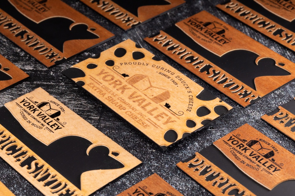 York Valley luxury brand business card with dark background and foil letterpress details